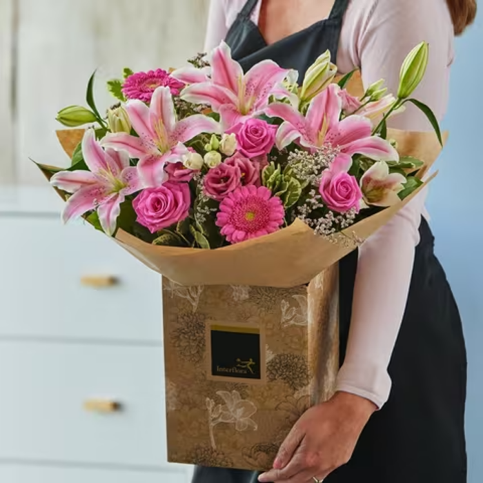 pink roses and lilies hand-tied